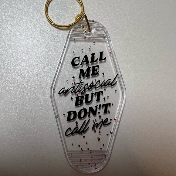 “Call Me Antisocial But Don’t Call Me” keychain with confetti/sparkle background - Picture 1 of 2